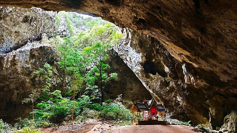 Inside Phraya Nakhon Cave, there are beautiful stalactites and stalagmites